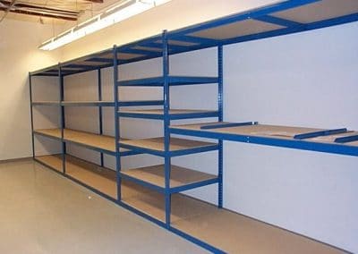 blue shelving with wood bottoms