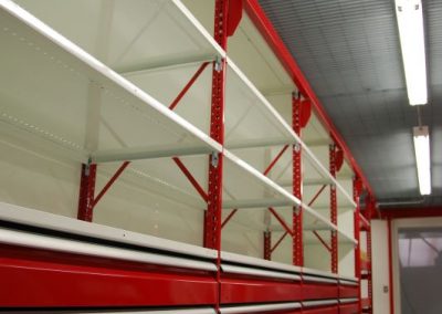 red shelving with drawers