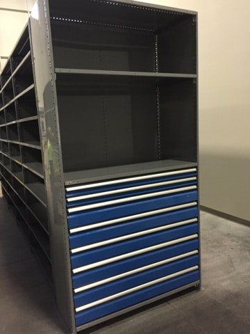 grey shelving with blue drawers