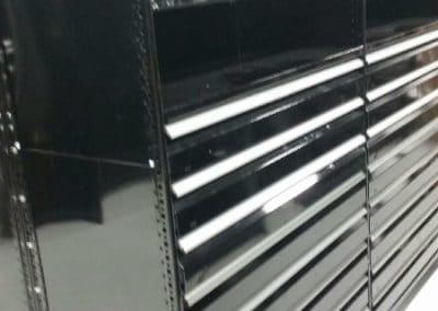 black shelving with drawers