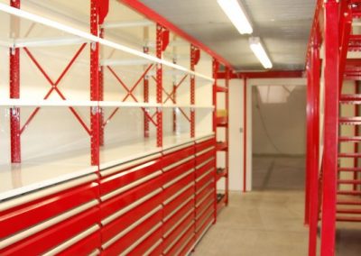 red shelving with drawers