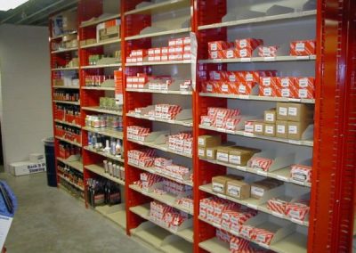 red shelving with products