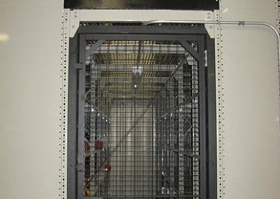 gated door with shelving