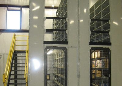 gated door with shelving